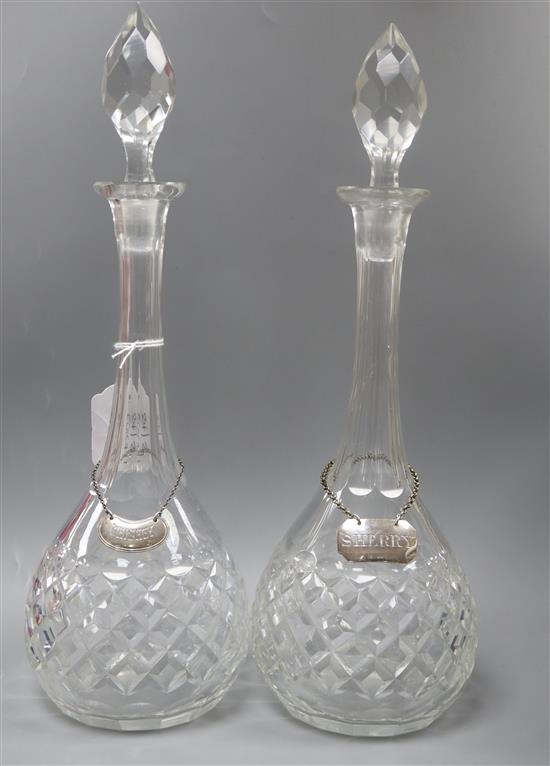 A pair of Bohemian glass decanters with two 19th century silver labels, Sherry and Whiskey